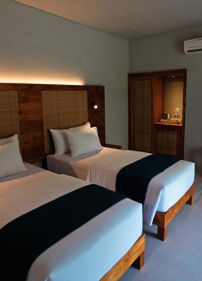 อูมาเทวี เซิร์ฟ แอนด์ สวีท Hotel ปูลูกาน ภายนอก รูปภาพ